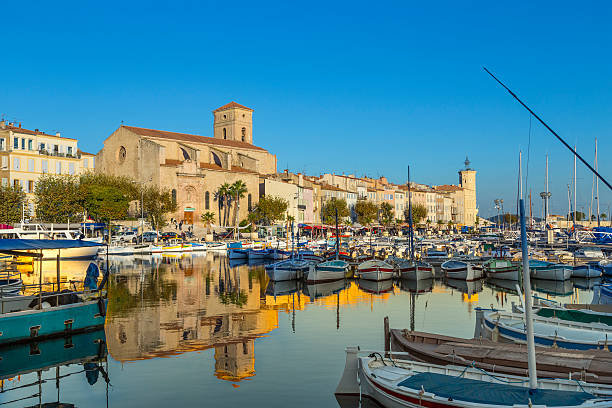 Yachts reflecting in blue water in La Ciotat