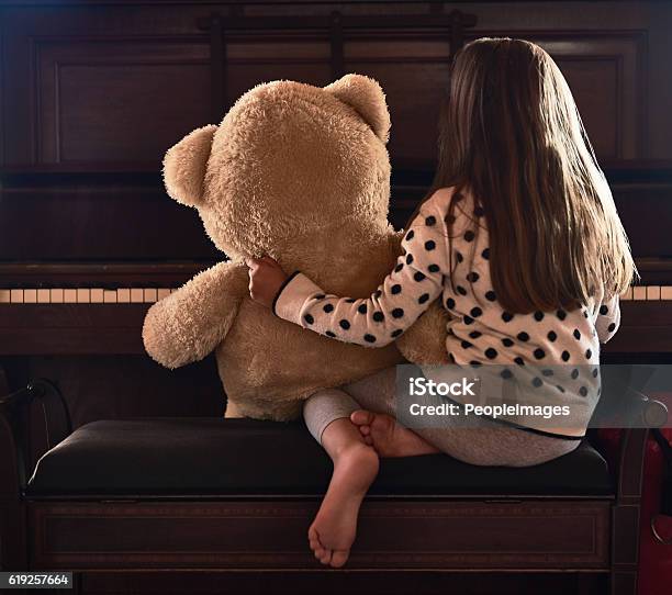 Sharing Her Talents With Her Teddy Stock Photo - Download Image Now - Brown Hair, Child, Girls