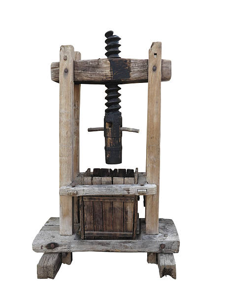 istock Ancient wooden wine old press isolated on white 619259256