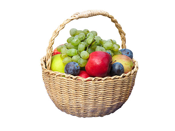 istock Fresh fruits arranged in a wicker basket isolated on white 619259558