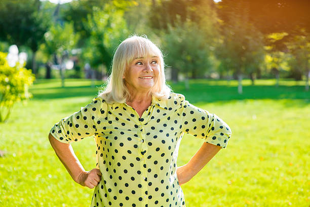 istock Woman with gray hair smiling. 619260578