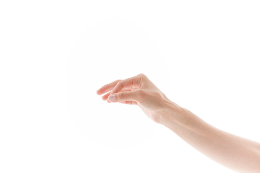Woman hand holding some like a blank object isolated on a white background.