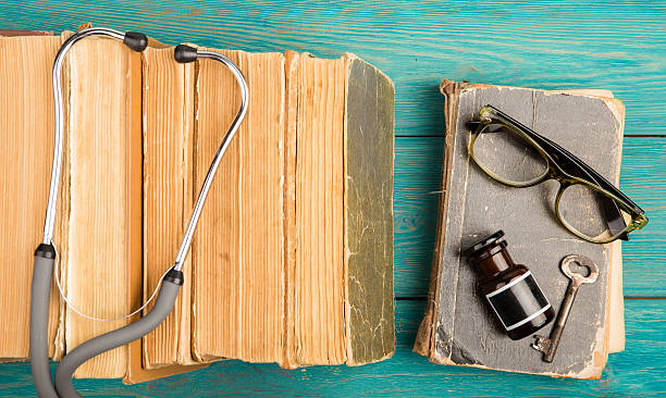 istock stethoscope, glasses, bottle and key 619264138