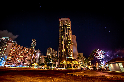 Honolulu, Oahu, Hawaii, United States - August 19, 2016: friday night fireworks at Hilton Hawaiian Village, luxurious resort overlooking Waikiki Beach near Ala Wai Harbor.