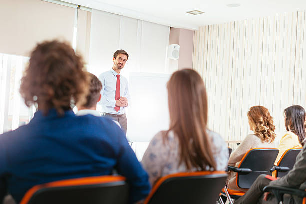 istock Expert on conference presenting new business opportunities 619265466