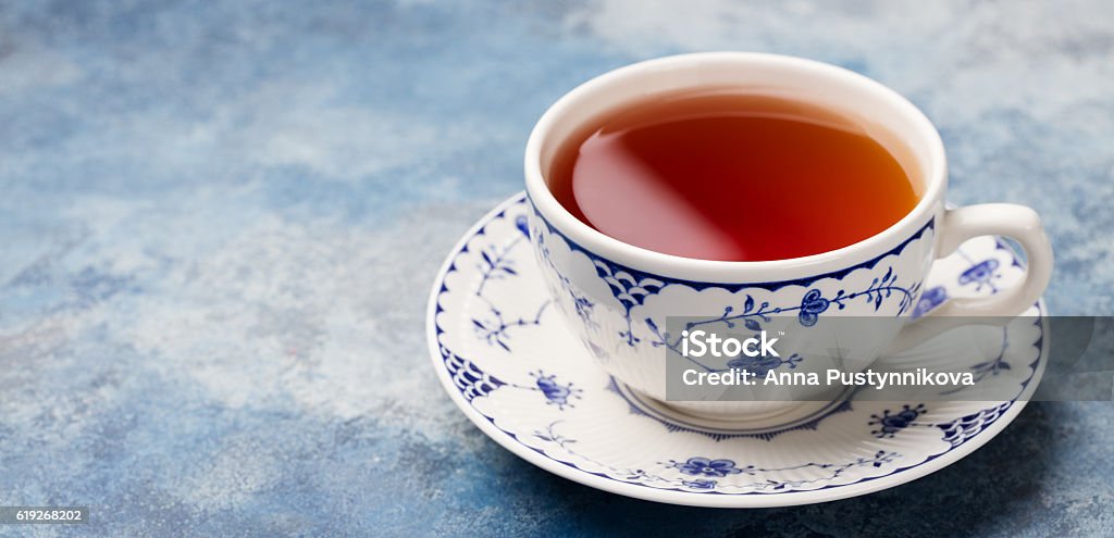 Cup of tea on a blue stone background. Copy space Cup of tea on a blue stone background. Copy space. Tea Cup Stock Photo