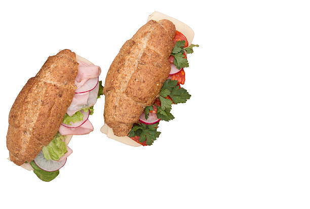 istock Sandwich with smoked meat and fresh vegetables isolated on white 619269254