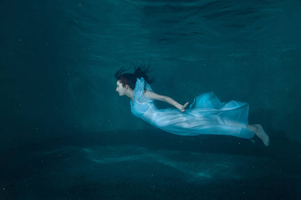 istock Woman in the pool. 619269688