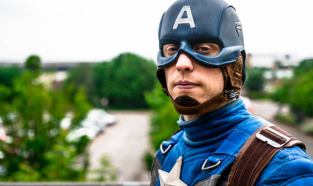 Cosplayer dressed as 'Captain America' from Marvel Sheffield, United Kingdom - June 11, 2016: Cosplayer dressed as 'Captain America' from Marvel at the Yorkshire Cosplay Convention at Sheffield Arena cosplay character stock pictures, royalty-free photos & images
