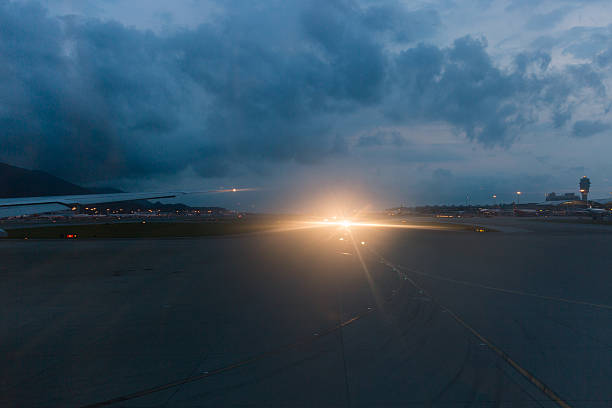 istock airplane in airfield at night 619275126
