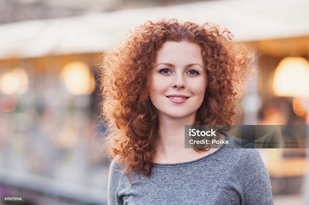 Beautiful young woman outdoors Gorgeous redhead woman outdoors portrait Women Stock Photo