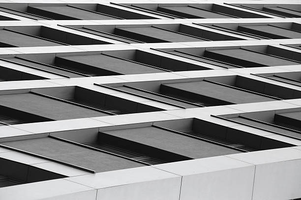 Low-angle close-up photo of modern building with modular concrete structure