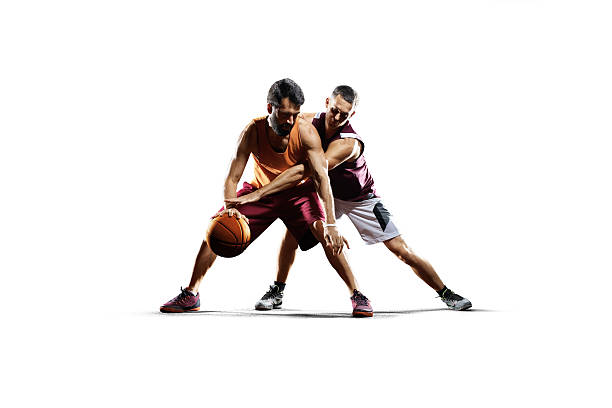 istock Basketball players in action isolated on white 619368442