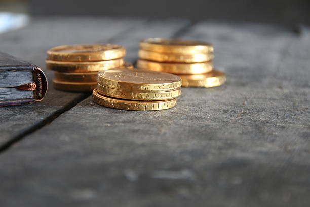 istock Golden coins, vintage style. 619368754