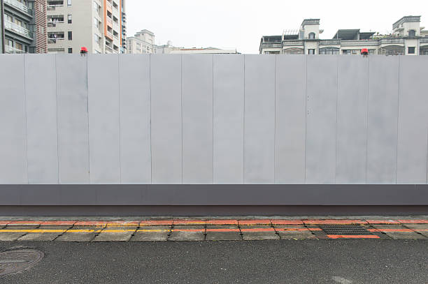 istock Large blank billboard on a street wall 619370362
