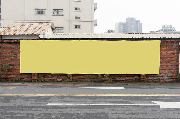 istock Large blank billboard on a street wall 619370734