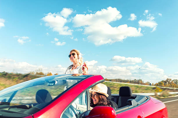 istock Female friends in the cabriolet 619371226