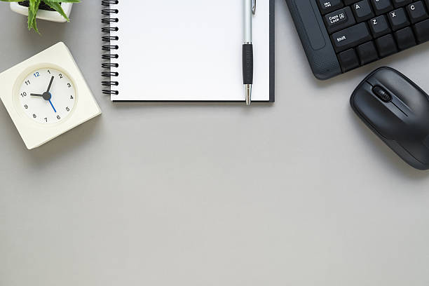 istock Table top view of office desk with stationery 619373396