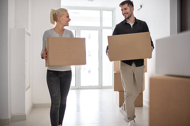 istock Couple moving into new building 619373582