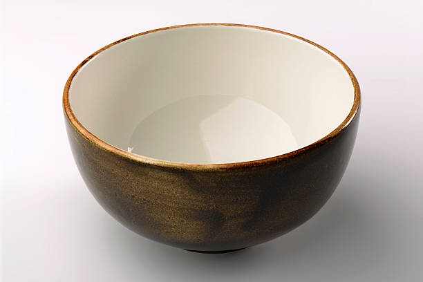 istock Rustic brown chinese bowl isolated on white background 619373936