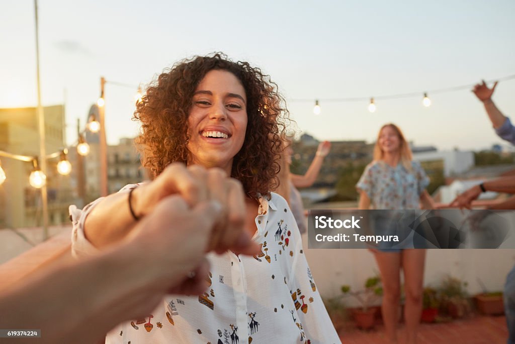 Dancing with my girlfriend at a rooftop party from pov Dancing with my girlfriend at a rooftop party from pov. Dancing Stock Photo