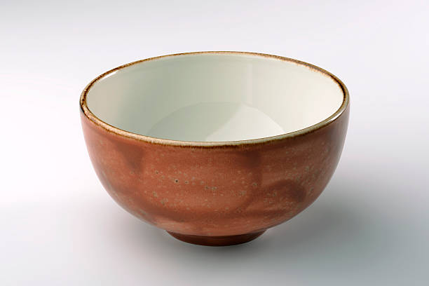 istock Rustic ocher chinese bowl isolated on white background 619374272