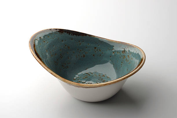 istock Blue rustic chinese bowl isolated on white background 619374312