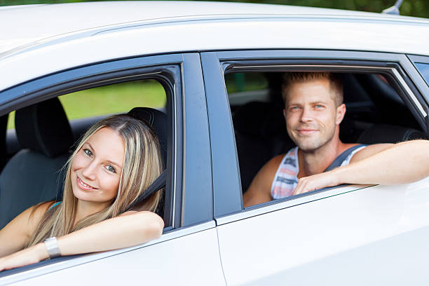 istock Young people enjoying a roadtrip in the car 619374318