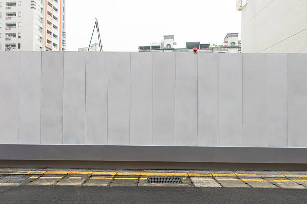istock Large blank billboard on a street wall 619374340