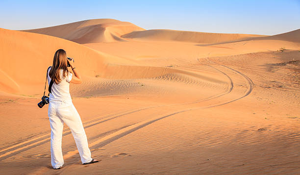 istock Photographer in the desert 619374442