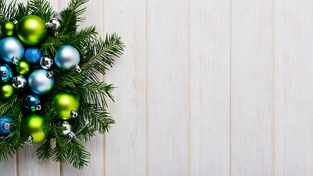 Christmas background with green and blue ornaments