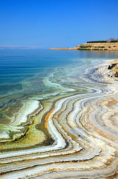 Salt layers at the Dead Sea shore, Jordan stock photo