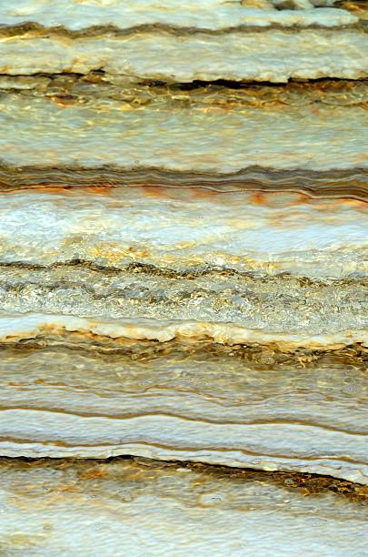 istock Salt layers at the Dead Sea shore, Jordan 619376316