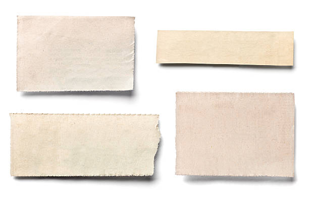 istock white news paper ripped message background 619376574