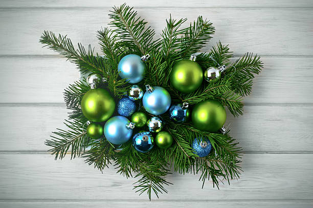 istock Christmas table centerpiece with blue and green ornaments, toned 619378930