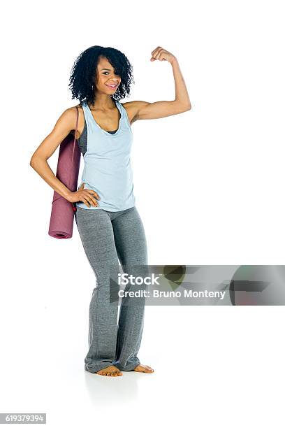 Female Model Attractive Woman Showing Strength With Arm Curl Stock Photo - Download Image Now