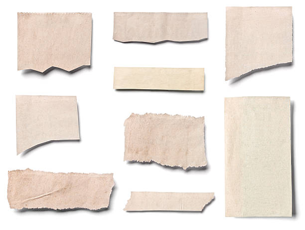 istock white news paper ripped message background 619379620