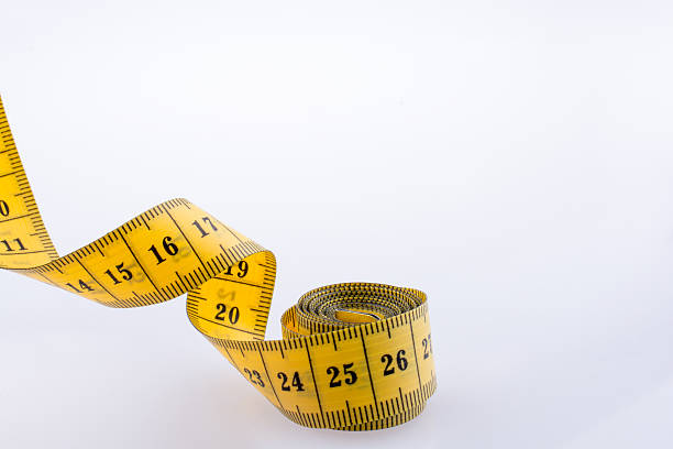 istock Yellow color measuring tape 619380482