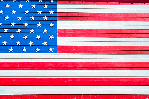 Photo of US flag painted siding along Route 66 in Arizona, USA.
