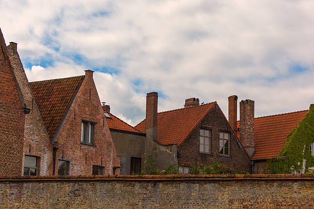 istock Historical gothic buildings at brugge belgium 619383514