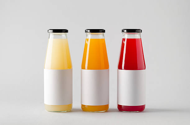 istock Juice Bottle Mock-Up - Three Bottles. Blank Label 619383646