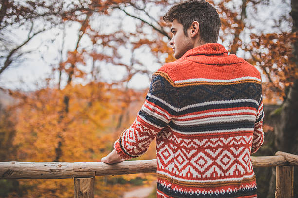 istock Handsome man on autumn day 619384224