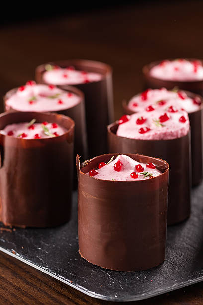 istock Portion chocolate desserts with berry mousse 619385640