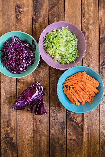 istock Healthy Organic Vegetables on a Wooden Background 619386514