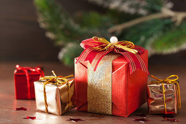 istock red and golden christmas gift box and decoration 619389774