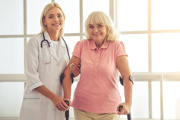 istock Doctor and old people 619394254
