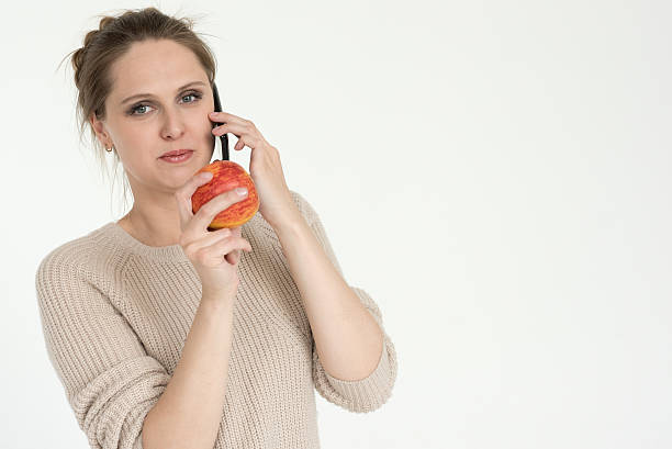 portait of woman with apple
