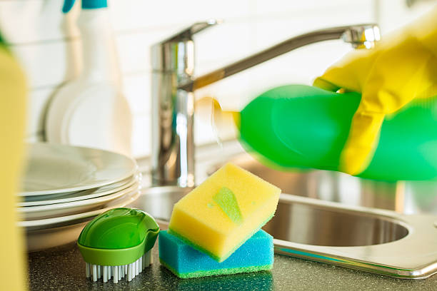 istock pouring dishwashing liquid on sponge kitchen wash cleaning 619397094
