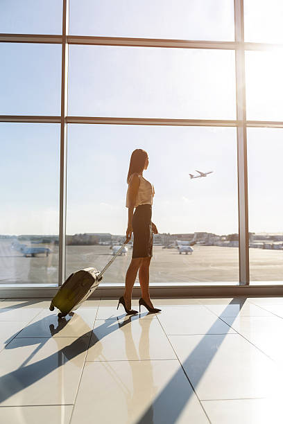 istock Woman going on business trip 619397858