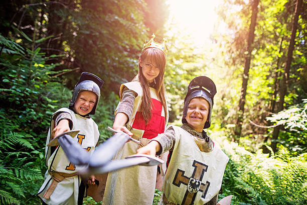 istock Team of knights in forest 619401060